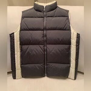 White and gray puffer vest from Outdoor Exchange, size large.
